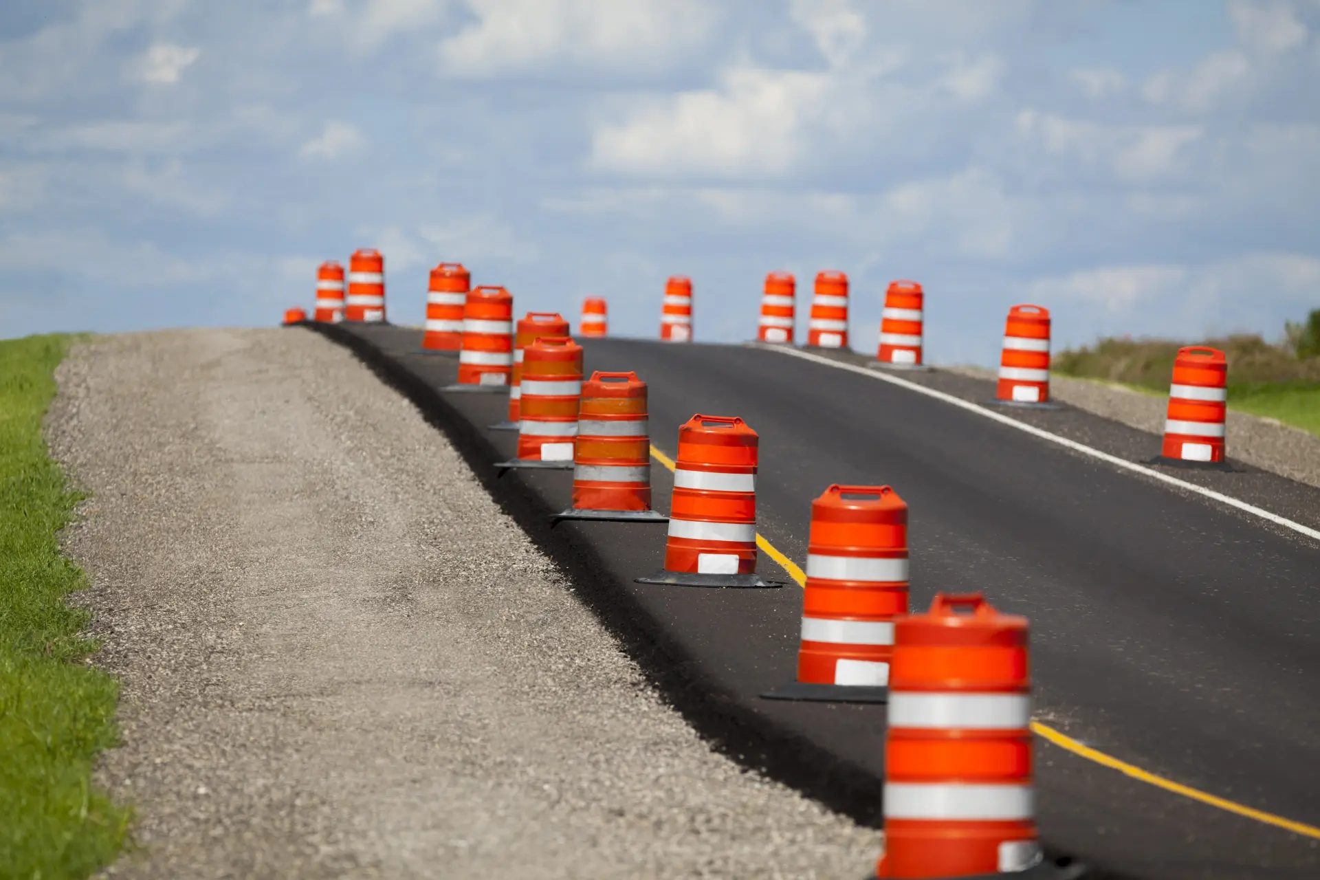 A new road with clean road markings and crisp black asphalt